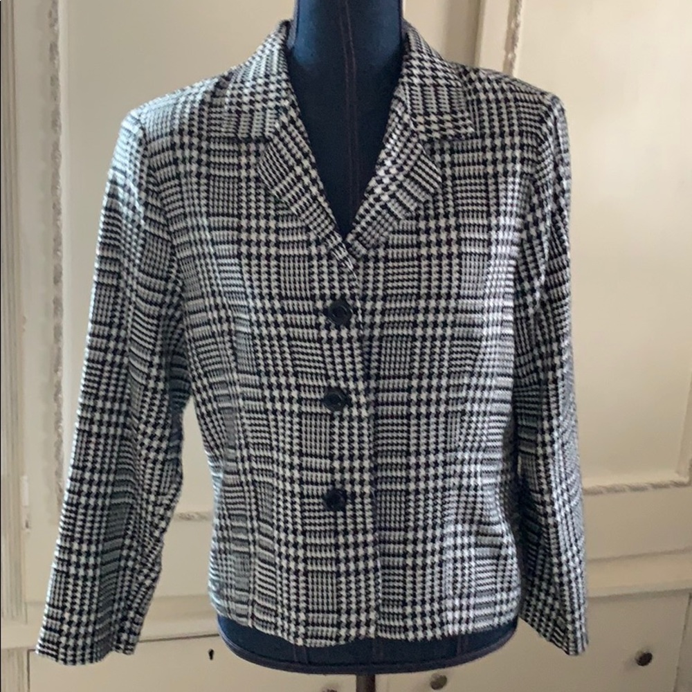 Woman’s suit coat size 12